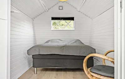 a bed in a white room with a window at Amazing Home In Højslev With Wifi in Højslev