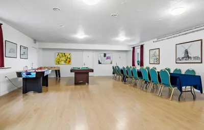a room with a table and chairs in a room at 11 Bedroom Gorgeous Home In Hurup Thy in Hurup