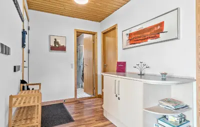 a kitchen with white walls and a wooden ceiling at Awesome Home In Vemb With Kitchen in Vemb