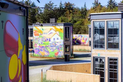 a mural on the side of two trailers at Fun Art Blokhus in Blokhus