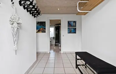 a hallway with a bench in a room at Amazing Home In Aars With Wifi in Års