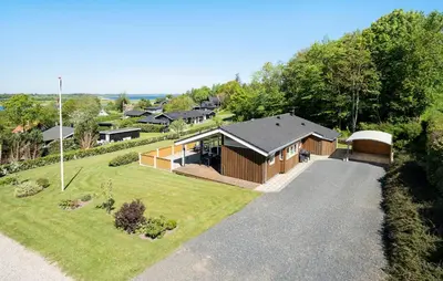 an aerial view of a house with a yard at 3 Bedroom Stunning Home In Løgstrup in Løgstrup