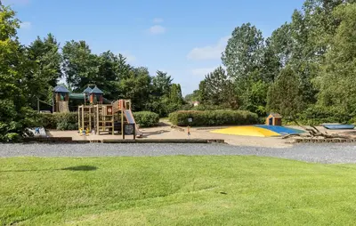 a park with a playground with a play equipment at 3 Bedroom Beautiful Home In Roslev in Roslev