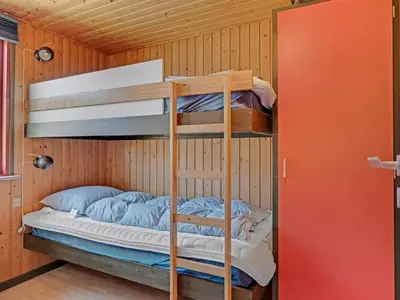 a bunk bed room with a bunk bed in a cabin at Holiday Home Frandsine - 1-2km from the sea by Interhome in Thisted