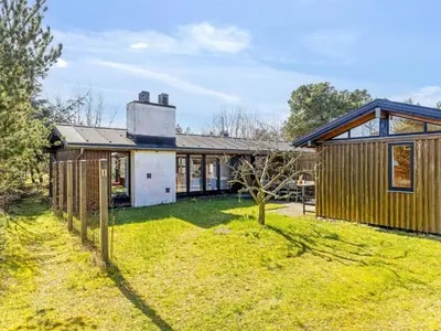 an image of a house with a yard at Holiday Home Amarie - 1km from the sea by Interhome in Pandrup