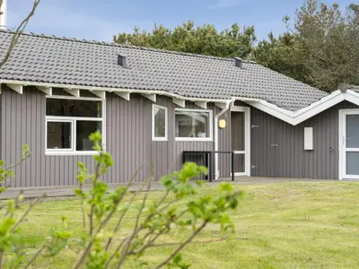 a home with a gray house at Holiday Home Sella - 200m from the sea by Interhome in Torsted