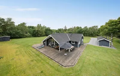 an overhead view of a house with a deck at 3 Bedroom Cozy Home In Højslev in Højslev
