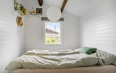 a bed in a white room with a window at 2 Bedroom Lovely Home In Thisted in Thisted