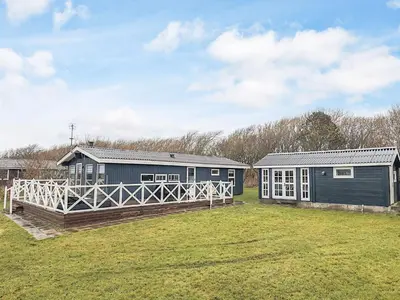 a large yard with two buildings in a field at 7 person holiday home in Vestervig-By Traum in Vestervig