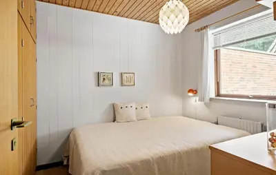 a bedroom with a bed and a window at Stunning Home In Højslev With Wifi in Højslev