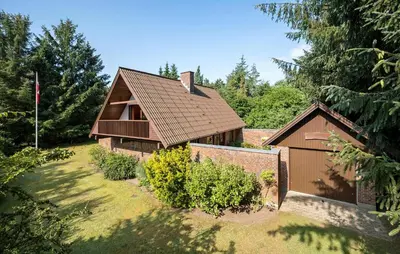 a house with a brown roof and a yard at Stunning Home In Højslev With Wifi in Højslev