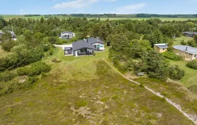 an aerial view of a house on a grassy field at Lovely Home In Hurup Thy With Wifi in Sindrup