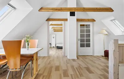 a dining room with a white table and chairs at Stunning Home In Ranum With Wifi in Ranum