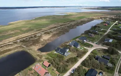 an aerial view of a river and houses at 3 Bedroom Stunning Home In Vestervig in Vestervig