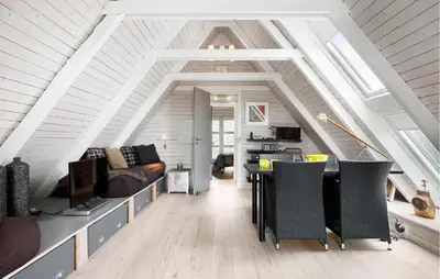 a living room with a couch and a table at 3 Bedroom Stunning Home In Vestervig in Vestervig