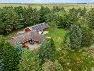an overhead view of a house with solar panels on it at Holiday Home Aisling - 700m from the sea by Interhome in Brovst