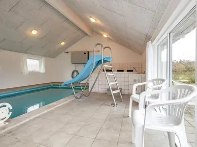 a house with a swimming pool and a slide at 14 person holiday home in Højslev in Sundstrup