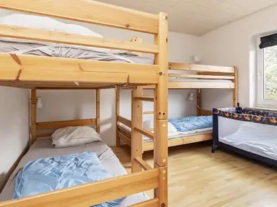 a bunk bed room with two bunk beds at Rustic Retreat in Gettrup - By Traum Ferienwohnungen in Sindrup