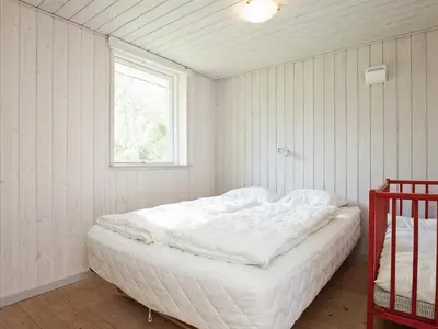 a white bed in a room with a window at 8 person holiday home in Hurup Thy-By Traum in Sindrup