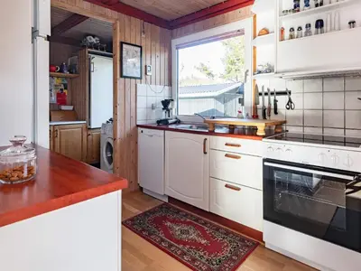 a kitchen with white appliances and a window at 4 person holiday home in Hurup Thy-By Traum in Sindrup