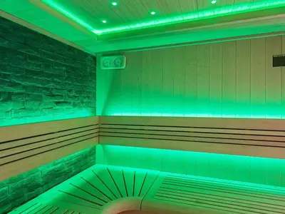 a empty sauna with green lights in a room at 8 person holiday home in Højslev-By Traum in Bøstrup