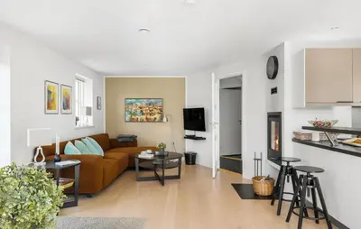 a living room with a couch and a table at Beautiful Home In Thisted With Sauna in Thisted