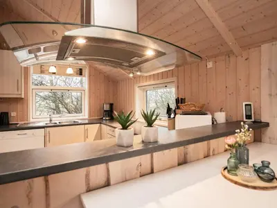 a kitchen with a large counter top in a room at 6 person holiday home in Vinderup-By Traum in Vinderup