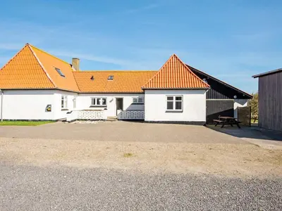 a white house with an orange roof at 17 person holiday home in Harboøre-By Traum in Harboør