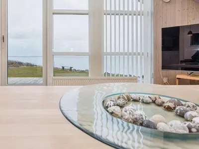 a bowl filled with shells on a table in a room at 4 person holiday home in Vinderup-By Traum in Vinderup