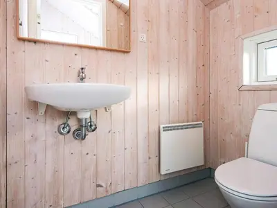 a bathroom with a sink and a toilet at 8 person holiday home in Harboøre-By Traum in Harboør