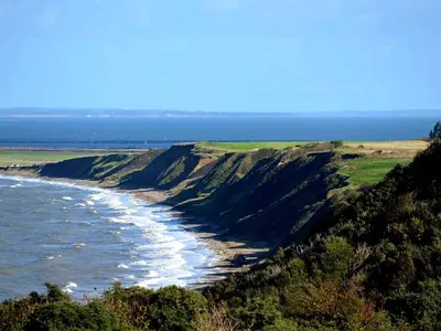 a view of the ocean from a cliff at 6 person holiday home in Struer-By Traum in Remmer Strand