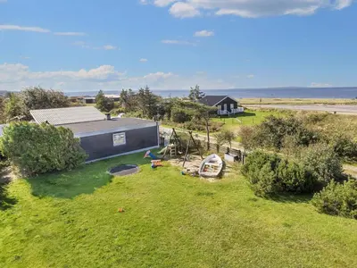 an overhead view of a house with a yard at 8 person holiday home in Løgstør-By Traum in Trend