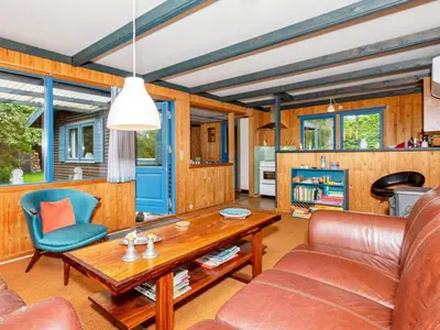 a living room with a couch and a table at 5 person holiday home in Højslev-By Traum in Bøstrup