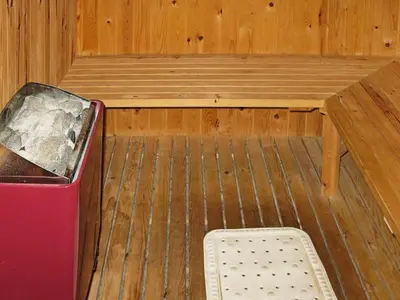 a sauna with a wooden table and aptionificialificialption at 6 person holiday home in Hurup Thy-By Traum in Sindrup