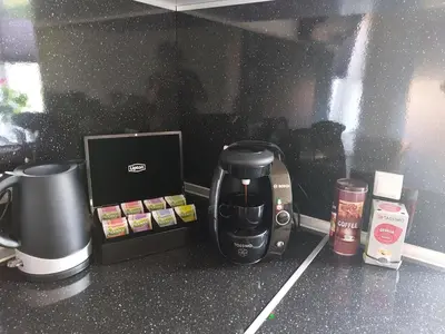a coffeemaker sitting on a counter with a coffee maker at Venos Home in Lemvig