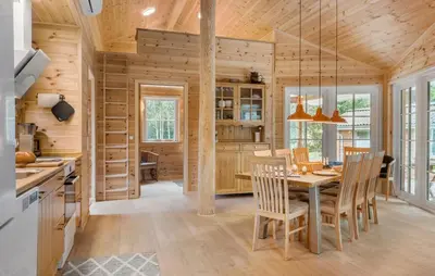 a kitchen and dining room with a table and chairs at 3 Bedroom Gorgeous Home In Skals in Skals