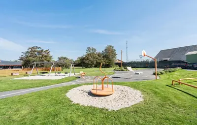 a park with a playground with a swing at Lovely Home In Bøvlingbjerg With Wifi in Bøvlingbjerg