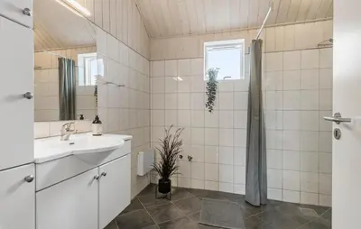 a bathroom with a sink and a shower at Beautiful Home In Farsø With Wifi in Farsø