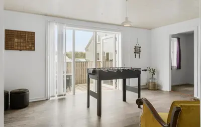 a room with a table with a foosball at 4 Bedroom Nice Home In Harboøre in Harboør