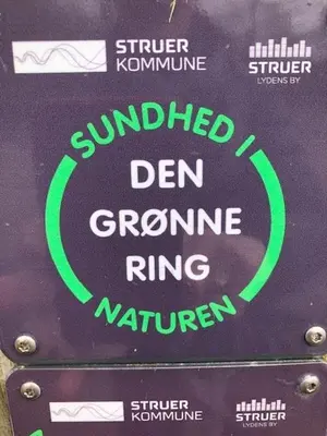a sign that saysauthorized den genome ring in green at Struer Festcenter - Vest Bowl lejlighed 1 Bredgade 62 C in Struer