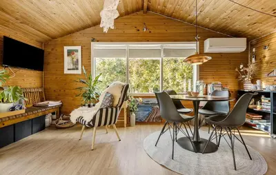 a dining room with a table and some chairs at 2 Bedroom Nice Home In Løgstør in Løgstør