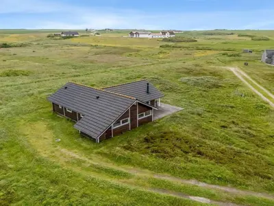 an overhead view of a house in a field at Holiday Home Märta - 250m from the sea by Interhome in Lemvig