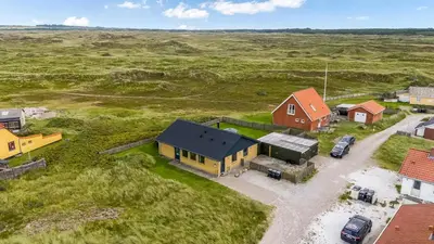 an aerial view of a house in a field at Lovely Holiday Home With Panoramic Views Of The North Sea in Frøstrup