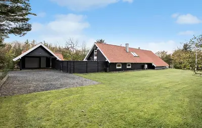 a house with a large yard in front of it at Cozy Home In Spøttrup With Wifi in Spottrup