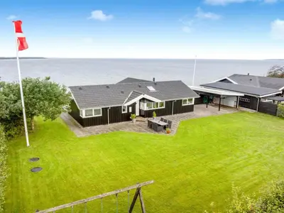 an aerial view of a house with a yard at Holiday Home Næwe - 10m to the fjord by Interhome in Roslev