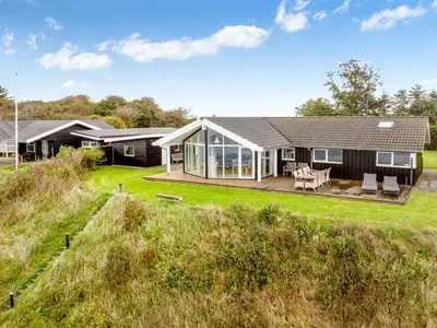 a home with a view of the backyard at Holiday Home Næwe - 10m to the fjord by Interhome in Roslev