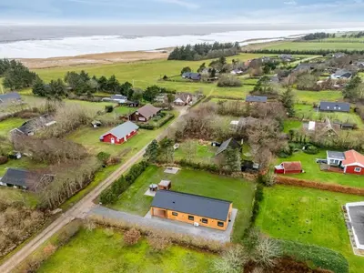 an aerial view of a farm with a barn and a house at Holiday Home Grimar - 400m to the fjord by Interhome in Vemb