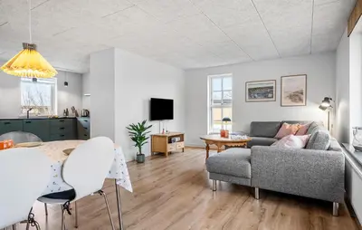 a living room with a couch and a table at Amazing Home In Vestervig With Wifi in Vestervig