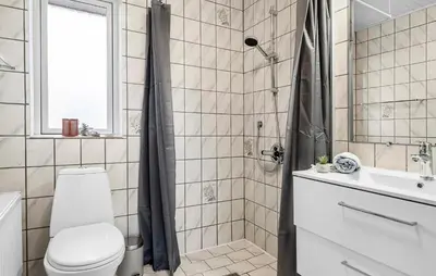 a bathroom with a toilet and a sink at Amazing Home In Vestervig With Wifi in Vestervig