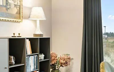 a lamp sitting on a book shelf next to a window at Amazing Home In Thisted With Wifi in Thisted